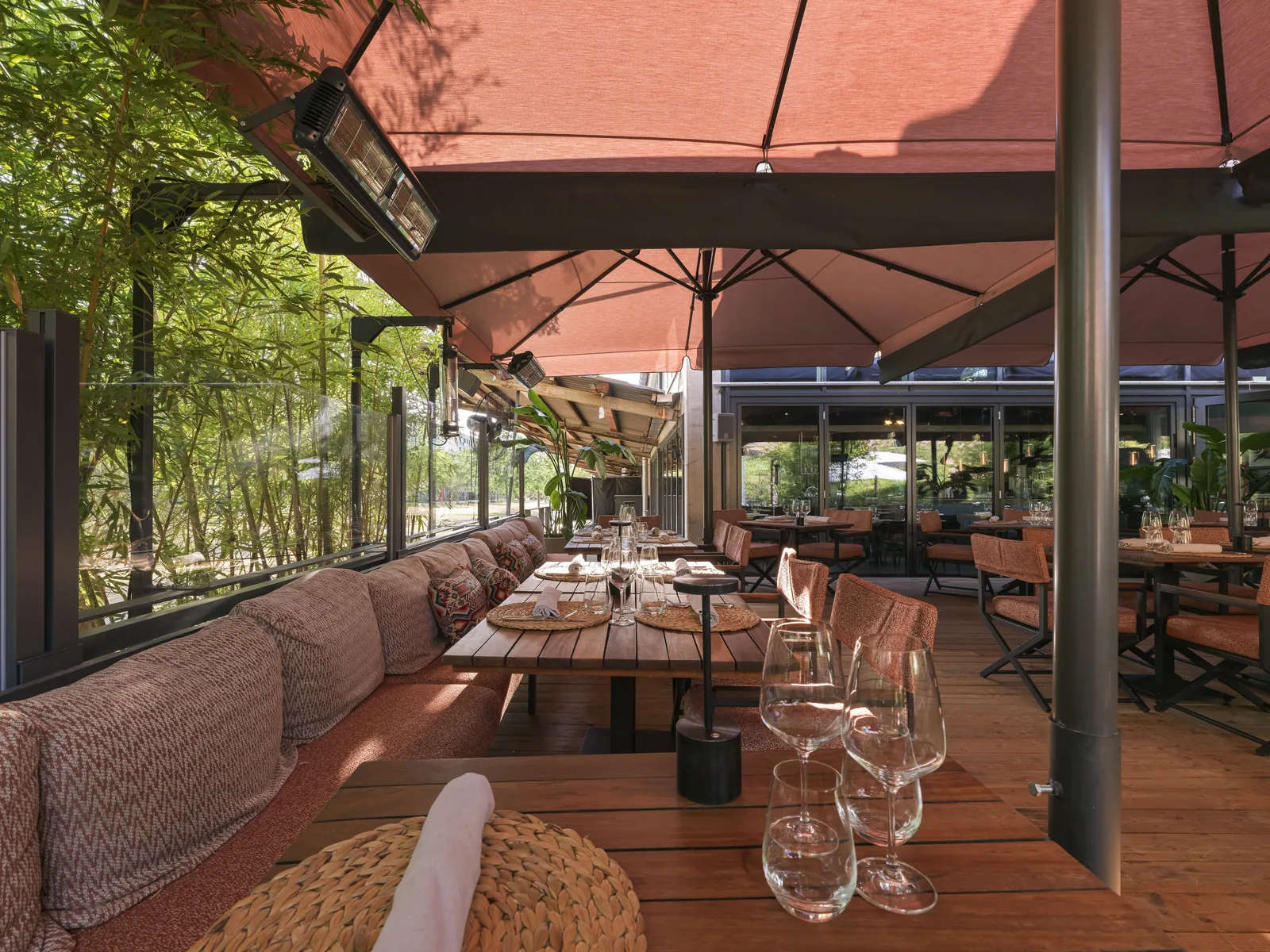 Terrace under red parasols